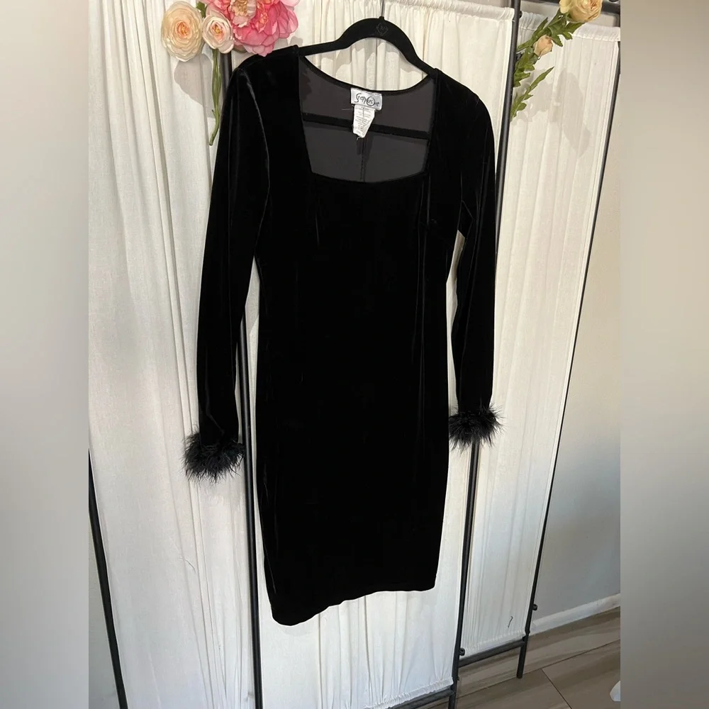 Vintage Stepping Out, black velour dress with black feather around the cuff. - Picture 1 of 5